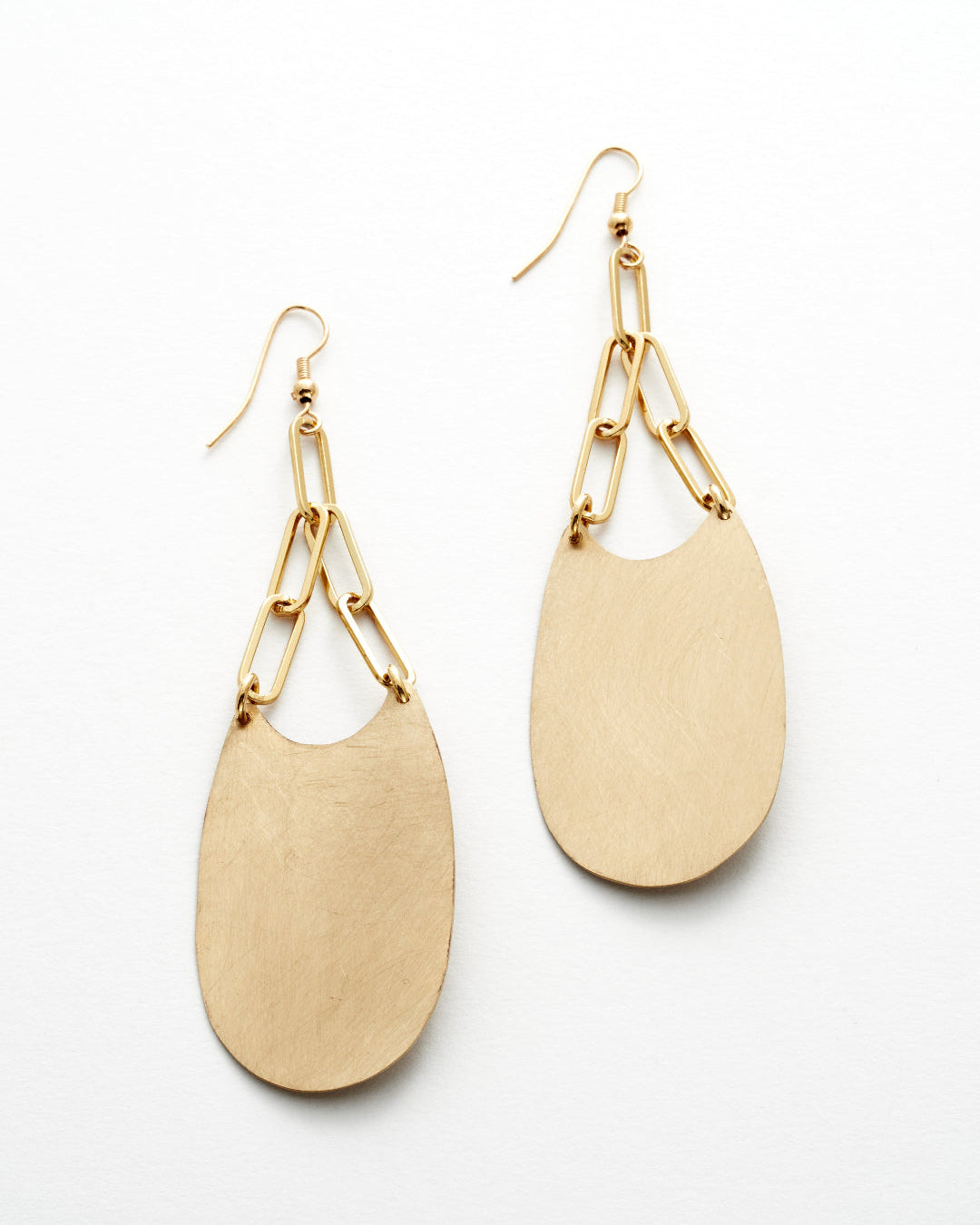 Bronze earrings on a white background