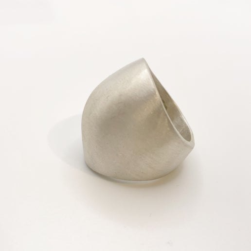 Silver ring on a white background