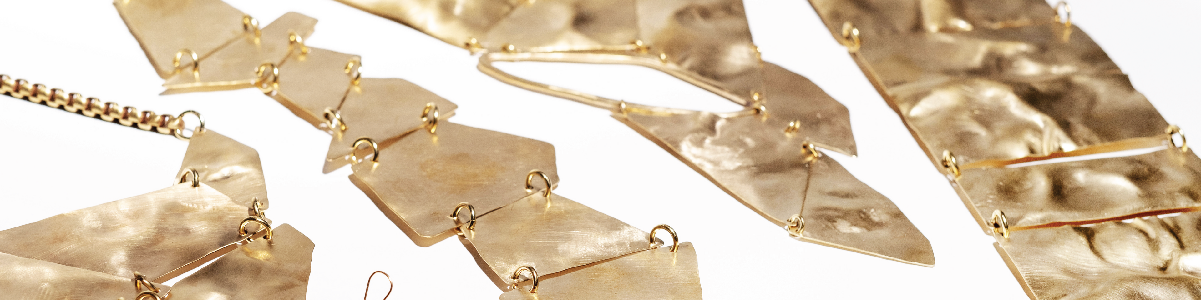 Collection of bronze jewellery made by Jenny Greco