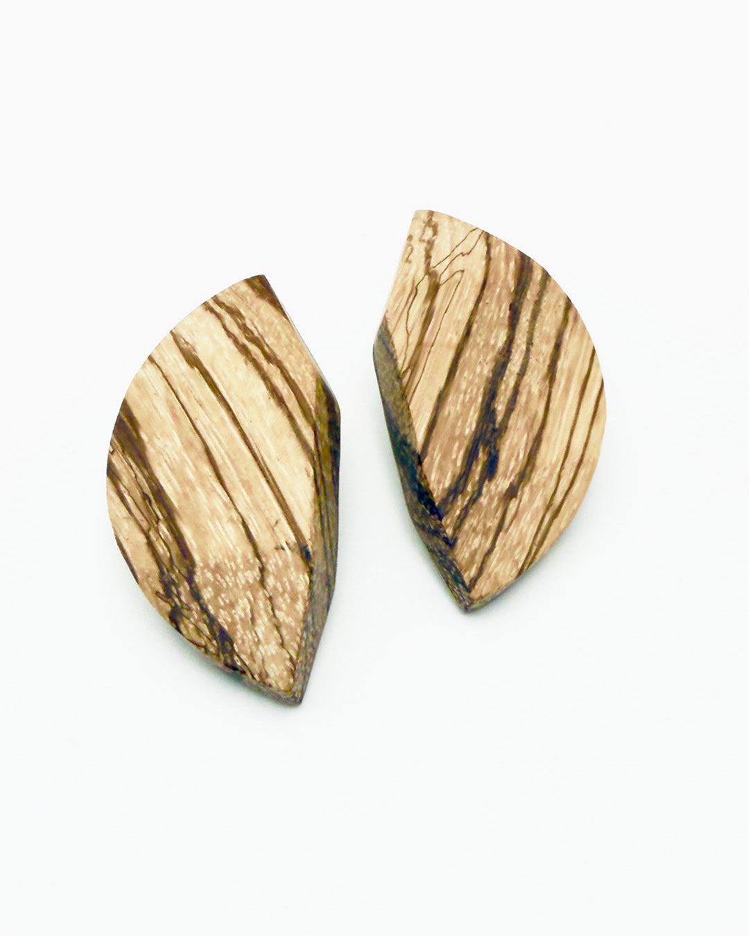 Wooden earrings with a natural pattern on a white background