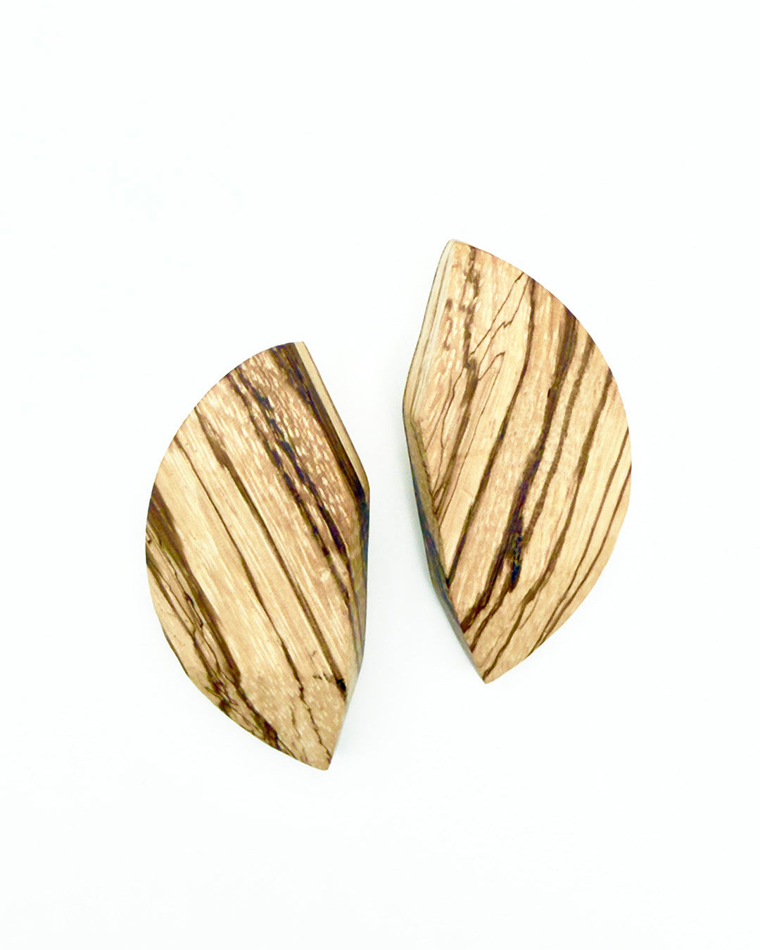 Wooden earrings with a striped pattern on a white background