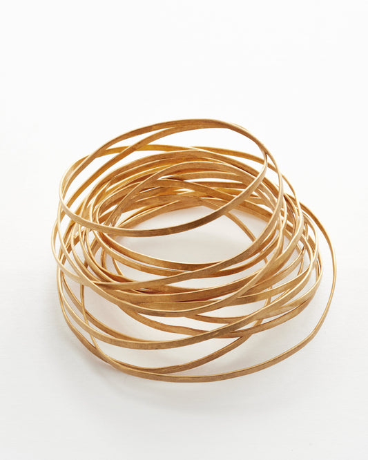 Bronze multistrand braclet white background