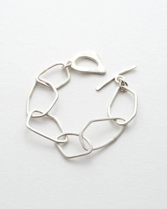Silver link bracelet on a white background