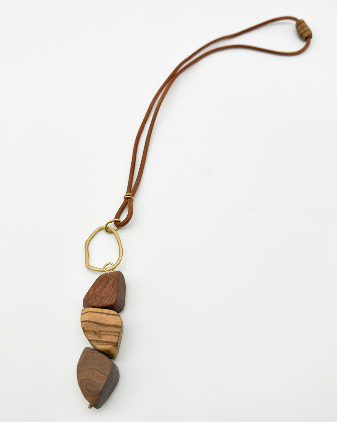 Wooden pendant necklace on a white background