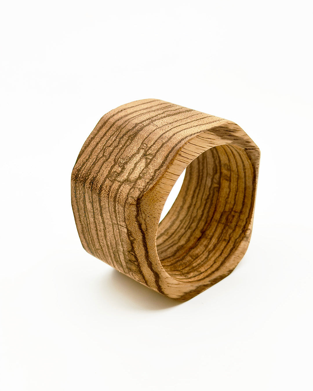 Wooden ring with a natural finish on a white background