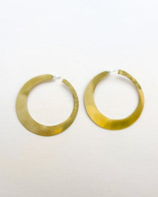 Bronze hoop earrings on a white background