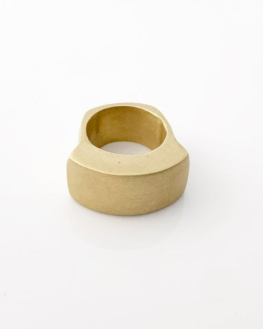 Gold ring on a white background