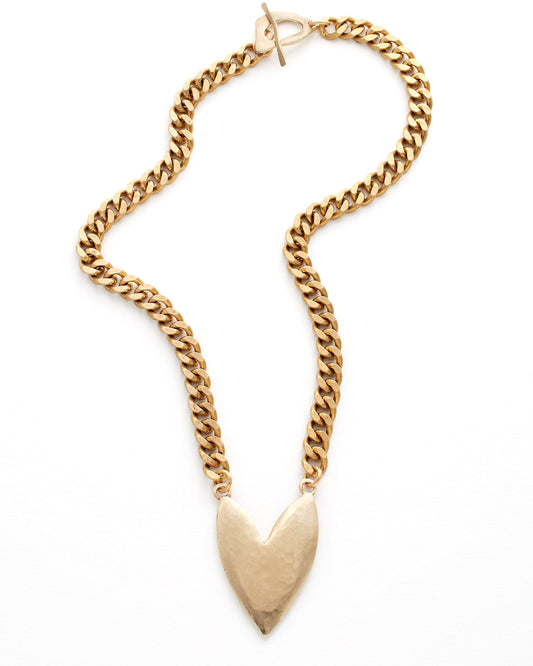 Gold chain necklace with a heart-shaped pendant on a white background