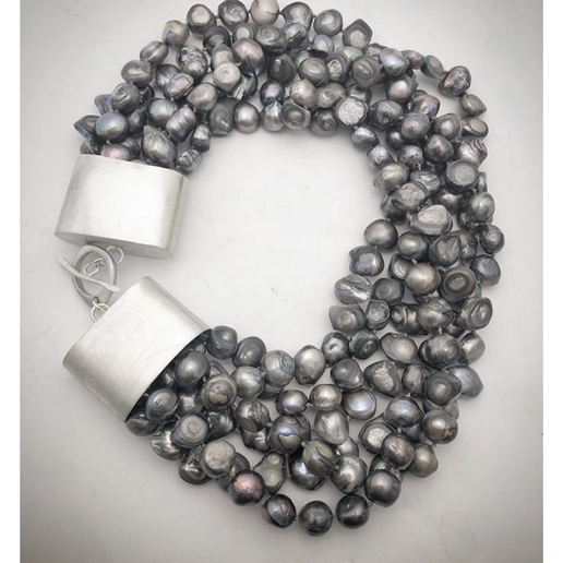 Gray pearl necklace with silver clasp on a white background