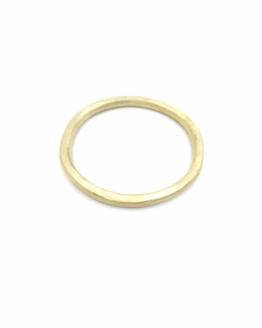 Solid bronze bangle on a white background