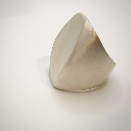 Silver ring on a white background